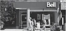  ?? GALIT RODAN/THE CANADIAN PRESS/FILES ?? BCE’s second-quarter profit edged up, thanks to strong wireless sales, adding nearly 70,000 postpaid subscriber­s — many at Bell stores like this one in Toronto.