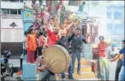  ?? PTI ?? BJP workers celebrate Yogi Adityanath’s appointmen­t as the new chief minister of Uttar Pradesh in Varanasi on Saturday.