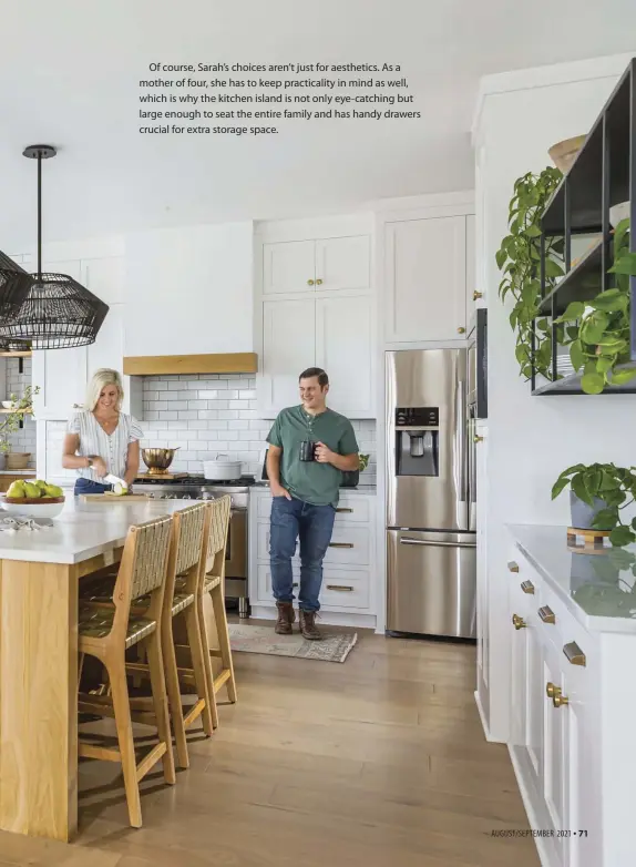  ??  ?? Of course, Sarah’s choices aren’t just for aesthetics. As a mother of four, she has to keep practicali­ty in mind as well, which is why the kitchen island is not only eye-catching but large enough to seat the entire family and has handy drawers crucial for extra storage space.