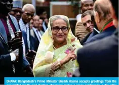  ?? ?? DHAKA: Bangladesh’s Prime Minister Sheikh Hasina accepts greetings from the assembled media and election observers during a press conference, a day after she won the 12th parliament­ary elections, in Dhaka on January 8, 2024. — AFP