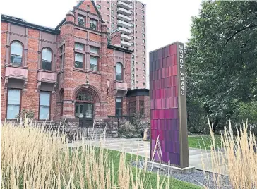  ?? SHAWN MICALLEF FOR THE TORONTO STAR ?? Casey House was called the “Grey Lady” because its now-revealed brilliant red bricks were painted grey for years.