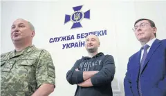  ??  ?? Russian opposition journalist Arkady Babchenko, centre, at a Ukrainian Security Service press conference in Kiev, Ukraine, on Wednesday.