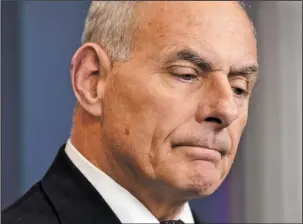  ?? The Associated Press ?? KELLY: White House Chief of Staff John Kelly pauses as he speaks to the media Thursday during the daily briefing in the Brady Press Briefing Room of the White House.