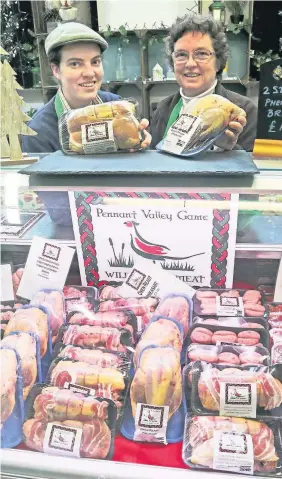  ??  ?? &gt; Izzy Hosking and Christine Cherry, of Llangynog, north Powys, show off a selection of their Pennant Valley Game farm products at the Cywain stand