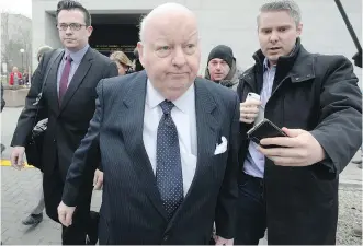  ?? ADRIAN WYLD/ THE CANADIAN PRESS ?? Suspended senator Mike Duffy leaves the courthouse after the second day of his trial in Ottawa on Wednesday. It took Duffy less than 24 hours to file his first expense claim.