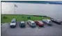  ?? PHOTO BY WILLIAM J. KEMBLE ?? Vehicles parked illegally at the boat launch in Rhinebeck, N.Y., are shown last Sunday.