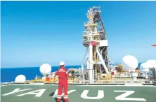  ?? Reuters ?? A Turkish Petroleum (TPAO) engineer poses on the helipad of Turkish drilling vessel Yavuz in the eastern Mediterran­ean off Cyprus.