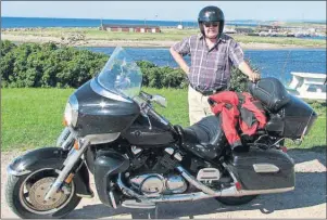  ?? SUBMITTED PHOTO ?? Here I am in Margaree Harbour, with the Acadian village of Belle Cote on the right, and the Cape Breton Highlands National Park on the horizon.