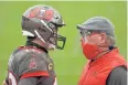  ?? AFP ?? Buccaneers QB Tom Brady, left, talks with head coach Bruce Arians.