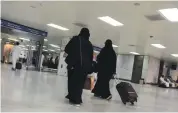  ?? AFP ?? Saudi women in Jeddah Airport departure hall. Every citizen now has the right to apply for a passport