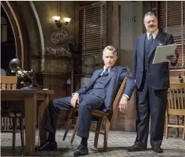  ?? — AP ?? In this undated photo provided by O&M/DKC, John Slattery (L) and Nathan Lane perform in a scene from the production of The Front Page. The play opened on October 20 at the Broadhurst Theatre in New York under the direction of three-time Tony...