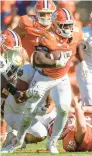  ?? GETTY
ISAIAH VAZQUEZ/ ?? Clemson running back Phil Mafah finished with 186 rushing yards and two touchdowns against Notre Dame on Saturday.