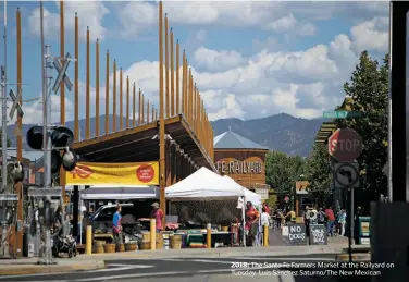  ??  ?? 2018: The Santa Fe Farmers Market at the Railyard on Tuesday. Luis Sánchez Saturno/The New Mexican