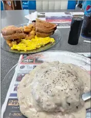  ?? ?? Right,
Chicken-fried hamburger steak with sausage gravy, eggs and hashbrowns