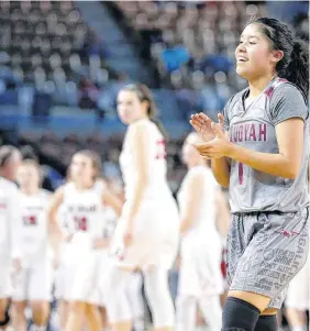  ?? [PHOTOS BY BRYAN TERRY, THE OKLAHOMAN] ?? Sequoyah Tahlequah’s Aubrey Brown celebrates after winning Friday’s Class 3A girls state basketball semifinal game between Comanche and Sequoyah Tahlequah in Jim Norick Arena at State Fair Park.