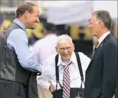  ?? Peter Diana/Post-Gazette ?? Steelers owners Dan Rooney and son Art joke with exSteelers head coach Bill Cowher, left, at M&T Bank Stadium in Baltimore.