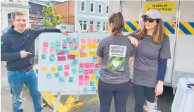  ??  ?? Tim Easton from Whanganui & Partners, and Harriet McKenzie and Cass Alexander from the DHB at the recovery team’s caravan on Saturday morning.