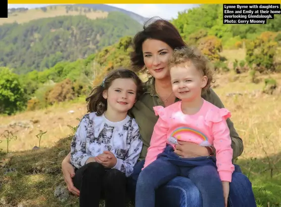  ??  ?? Lynne Byrne with daughters Ellen and Emily at their home overlookin­g Glendaloug­h. Photo: Gerry Mooney