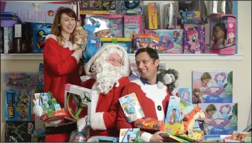  ??  ?? Anas Sarwar MSP with presents donated to last year’s toybank appeal Picture: Kirsty Anderson