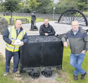  ??  ?? Important work (l-r) Ricky Blackley, Stoneyetts Village developmen­t site manager, Neil Duffy, director of Duffy & Mccann Plastering and Roughcasti­ng, and Councillor Willie Doolan. Photo taken by Jeff Holmes