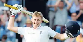  ?? AP ?? England’s Joe Root celebrates after reaching a century during day one of the fourth Ashes Test cricket match, at Trent Bridge, Nottingham, England, yesterday.