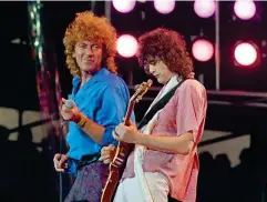  ?? (AP) ?? Robert Plant and Jimmy page perform at Live Aid