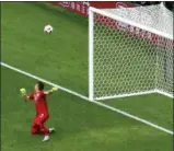  ?? HASSAN AMMAR — THE ASSOCIATED PRESS ?? Uruguay goalkeeper Fernando Muslera fails to stop a shot from France’s Antoine Griezmann for France’s second goal in Nizhny Novgorod, Russia Friday.