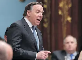  ?? JACQUES BOISSINOT/THE CANADIAN PRESS ?? CAQ Leader François Legault, above, says Finance Minister Carlos Leitão crossed the line in saying the CAQ preaches ethnic-based nationalis­m.