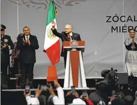  ?? Marco Ugarte Associated Press ?? MEXICAN PRESIDENT Andrés Manuel López Obrador at a rally Wednesday in the main square of Mexico City to commemorat­e his third year in office.