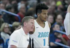  ?? YOUNG KWAK - THE ASSOCIATED PRESS ?? Gonzaga head coach Mark Few, left, speaks with guard Admon Gilder (1) during the second half of an NCAA college basketball game against Eastern Washington in Spokane, Wash., Saturday, Dec. 21, 2019. Gonzaga won 112-77.