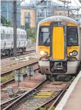  ?? JOHN STRETTON. ?? Passengers disembark from Govia Thameslink Railway 387110 - the 1142 London King’s Cross-Kings Lynn - on September 5. Performanc­e has been poor according to outgoing ORR Chief Executive Joanna Whittingto­n.