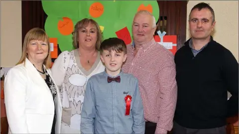  ??  ?? Cormac McGee (centre) who made his Confirmati­on on Friday in Carrig-on-Bannow Church, pictured with Breda O’Brien, Eleanor McGee, Jack McGee and Johnny Colfer.