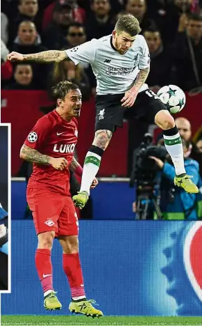  ?? — AFP / AP ?? Rising for Reds: Liverpool’s Alberto Moreno heading the ball away from Spartak Moscow’s Andri Eshchenko in the Champions League match in Moscow on Tuesday. Inset: Newcastle manager Rafa Benitez remains a popular figure at Liverpool.