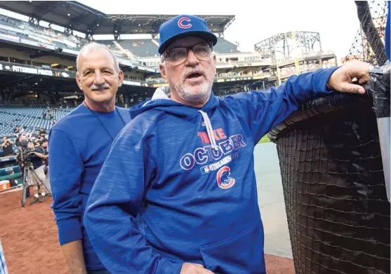  ?? TWITTER. COM/ CUBS ?? Ken Ravizza ( left, with Cubs manager Joe Maddon) was a pioneer in sports psychology whom Maddon brought with him when he came to the Cubs.