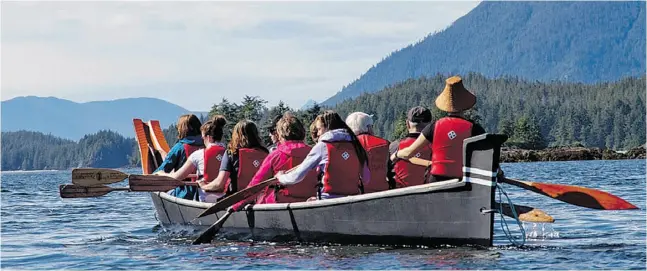  ?? tofinopadd­le.com ?? A traditiona­l-style whaling canoe, carved by Joe Martin from western red cedar, is now used for ecotourism in Tofino, B.C.