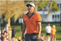  ?? JOHN RAOUX/THE ASSOCIATED PRESS ?? Kurt Kitayama walks off the green after putting on the 17th hole during Saturday’s third round of the Arnold Palmer Invitation­al in Orlando, Fla. Kityama made two birdies over the last three holes.