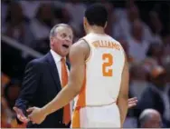  ?? AP PHOTO — WADE PAYNE ?? Tennessee coach Rick Barnes talks with forward Grant Williams (2) during the second half of an NCAA college basketball game against Florida on Saturday in Knoxville, Tenn. Tennessee won 73-61.