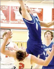  ?? PHOTO BY RICK PECK ?? McDonald County’s Rustan Lett draws an offensive foul on Simon Higginboth­am of St. Mary’s Colgan during the Panthers 65-43 win Dec. 13 at MCHS.