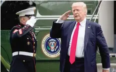  ??  ?? WASHINGTON: President Donald Trump arrives at the White House. — AP