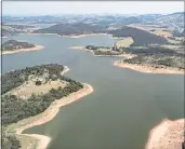  ?? ANDRE PENNER — THE ASSOCIATED PRESS ?? A general view of the Jaguari dam, which is part of the Cantareira System responsibl­e for providing water to the Sao Paulo metro area, in Braganca Paulista, Brazil.