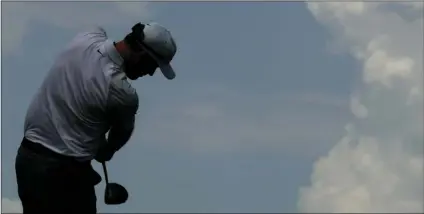  ??  ?? Russell Henley hits on the 12th tee as he practices for the PGA Championsh­ip golf Monday, at Bellerive in Saint Louis. (AP Photo/Charlie Riedel). AP PHOTO/MICHEL EULER