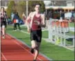  ?? TANIA BARRICKLO — DAILY FREEMAN FILE ?? Robert Becker captured the 400-meter run for Kingston in the Tigers’ loss to Monroe-Woodbury.