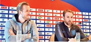  ?? — AFP photo ?? England manager Gareth Southgate and England’s striker Harry Kane (L) attend a press conference at The Grove Hotel in Watford, north of London on September 7, 2018.