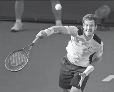  ?? Mark J. Terrill
Associated Press ?? ANDY MURRAY has struggled in recent years at the BNP Paribas Open, but on Saturday, he was able to adjust to windy conditions and defeat Marcel Granollers, 6- 4, 7- 6 ( 3), in a second- round match.