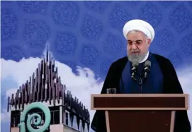  ?? AFP ?? El presidente Hasán Rohaní habló del enriquecim­iento de uranio en un mensaje que pronunció en el oeste de Teherán.
