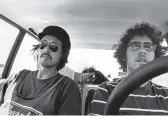  ??  ?? “Patrick, Johnie and Dave, On the Road,” 1976, gelatin silver print by Patrick Nagatani.