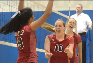  ?? File photo/The Signal ?? Hart’s Megan Soto (9), Ruby Duncan (10) and Kylie Tengberg (22) celebrate a point against Saugus at Saugus High on Thursday, September 20.