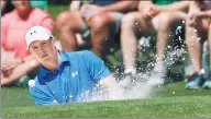  ?? MATT SLOCUM / AP ?? Jordan Spieth blasts out of a bunker on the second hole during Sunday’s final round of the Masters.