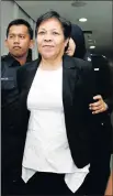  ?? SIN Picture: REUTERS/ LAI SENG ?? RELUCTANT MULE: Maria Elvira Pinto Exposto at court outside Kuala Lumpur