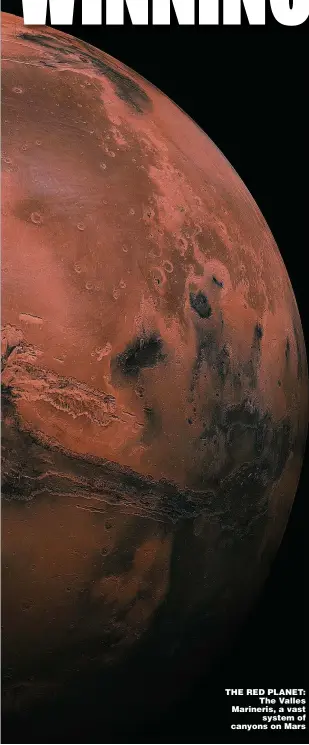  ??  ?? THE RED PLANET: The Valles Marineris, a vast system of canyons on Mars